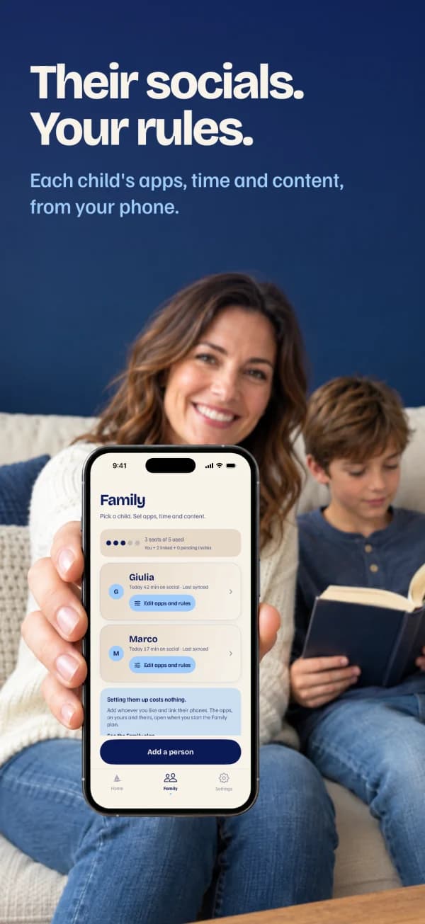 Their socials. Your rules. A mother on the sofa holds the phone, her son reads beside her; on screen, the family rules.